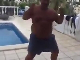 Fat latin daddy strips outdoors with his bear